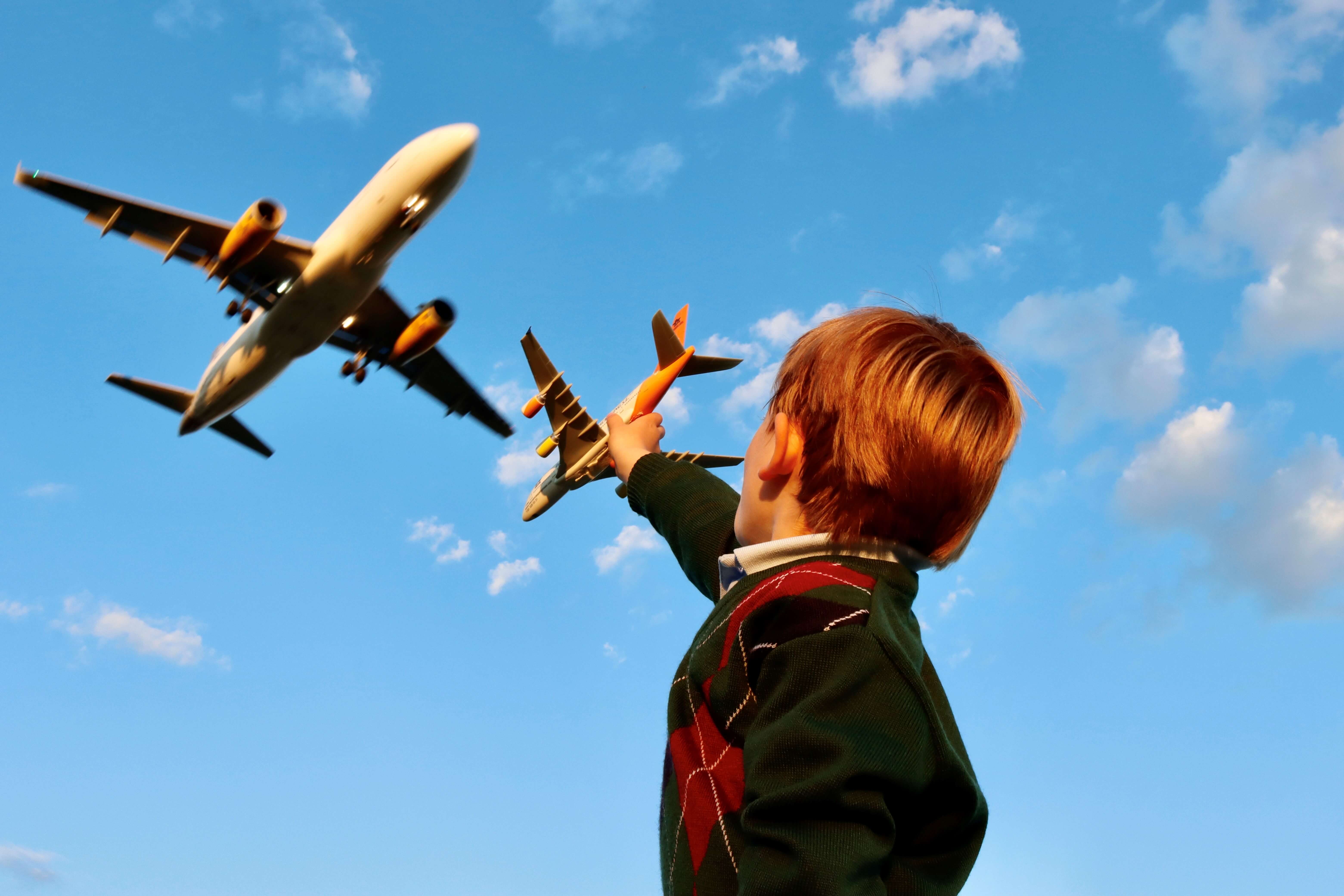 Kid And Plane