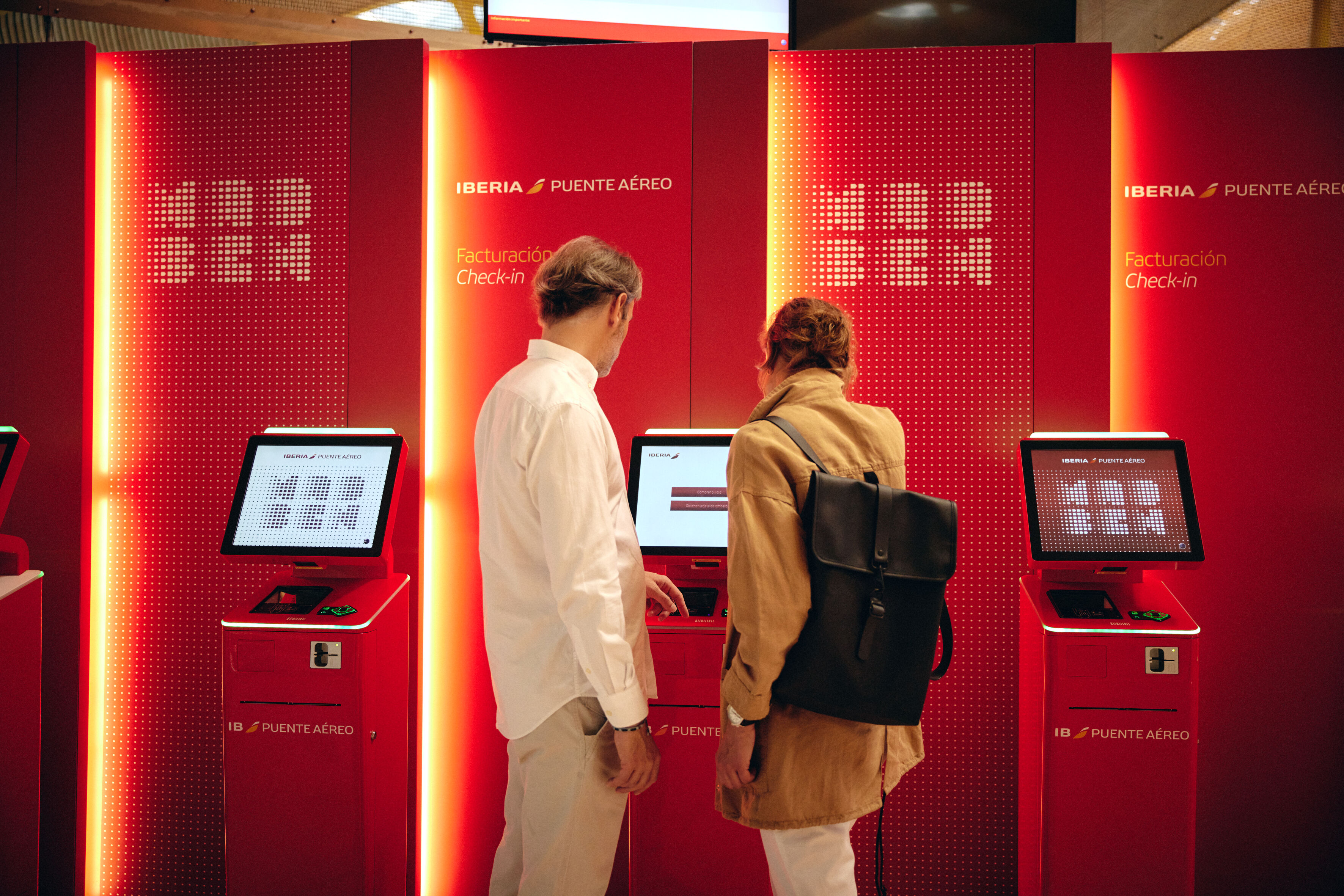 Iberia check-in kiosk being used