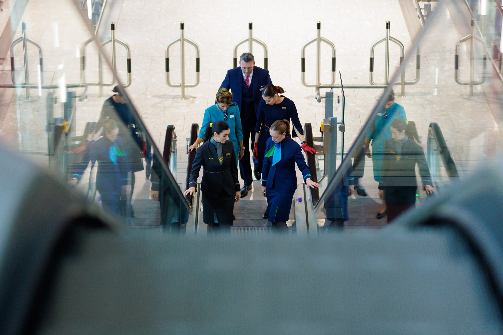 IAG staff on Heathrow escalator