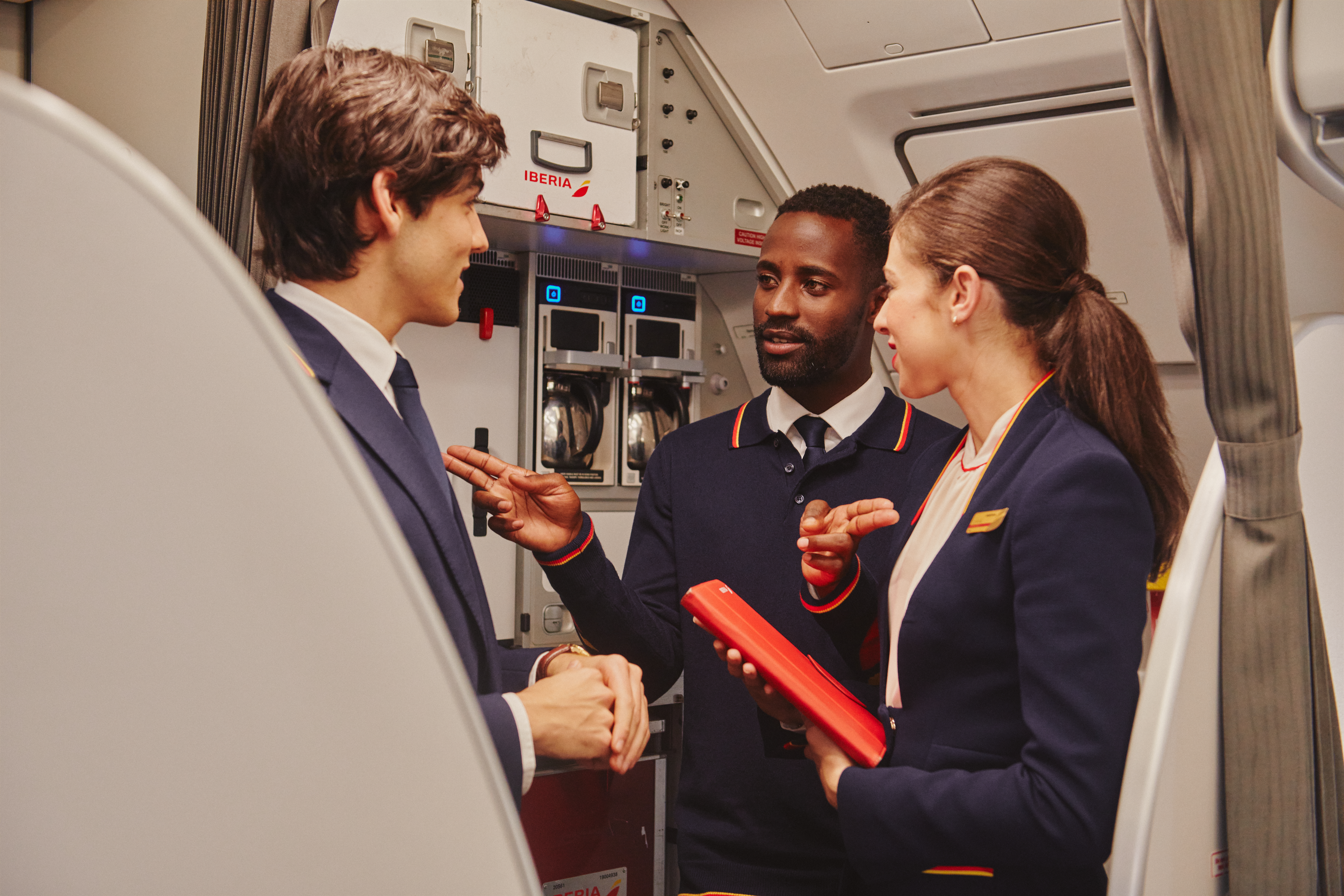 Iberia cabin crew on board plane