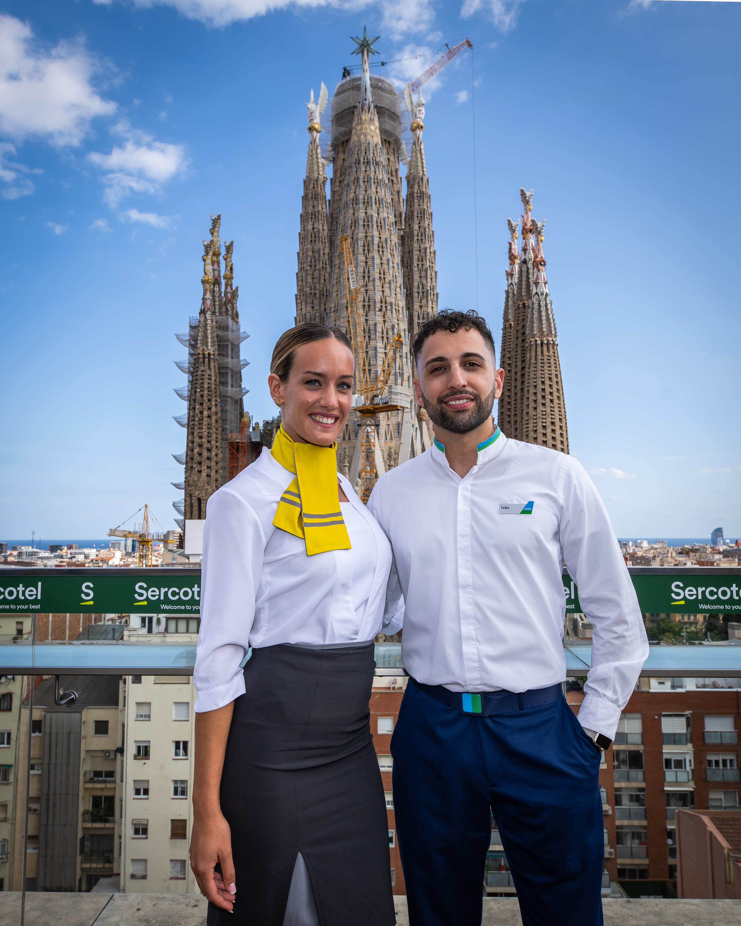 Vueling and LEVEL members of cabin crew posing in Barcelona