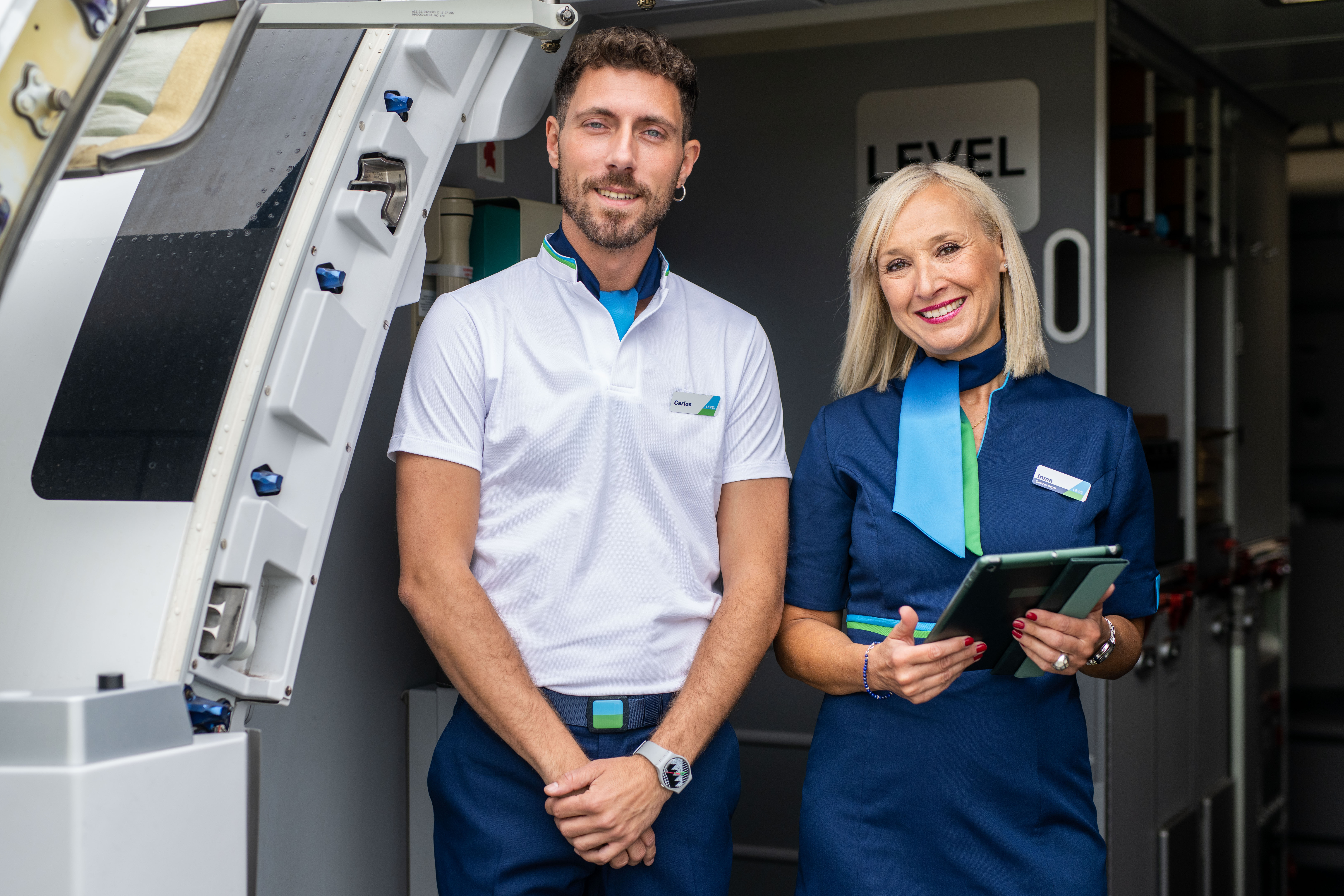 LEVEL cabin crew posing