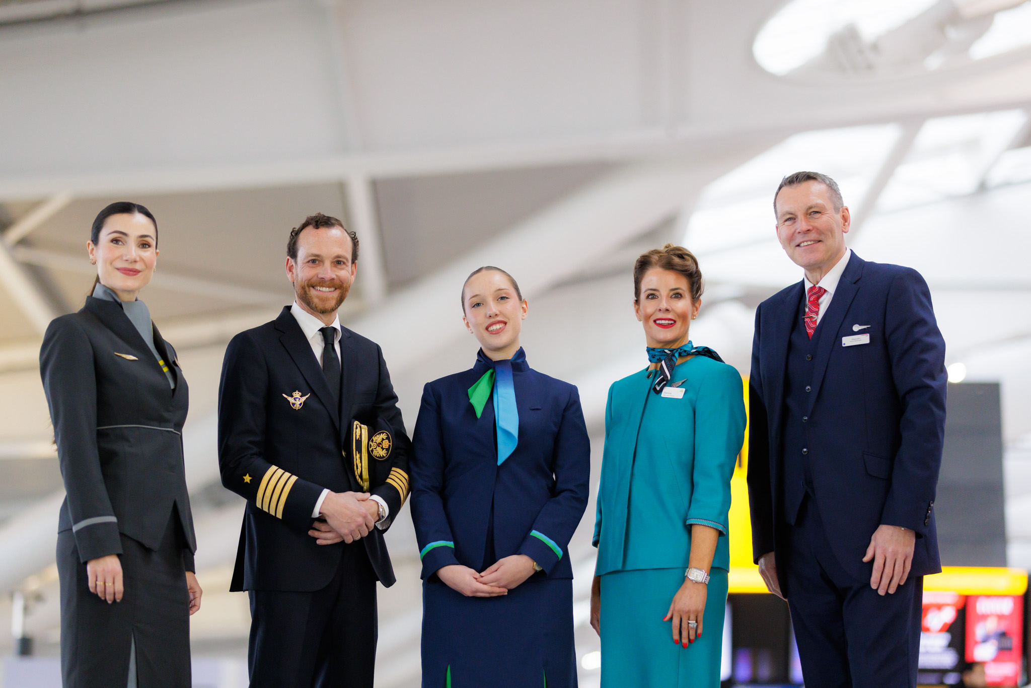 Iberia pilot and members of cabin crew from other IAG airlines posing