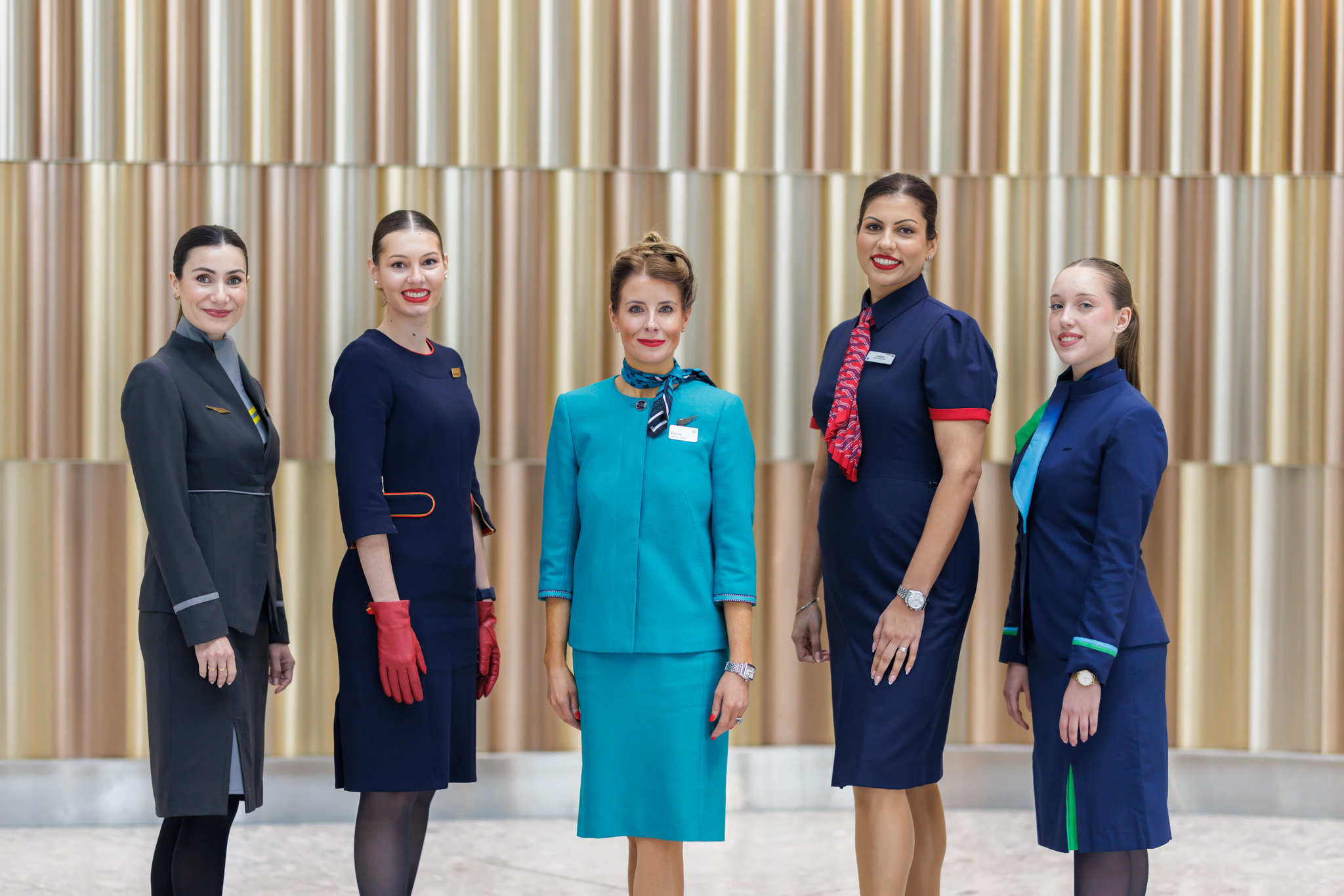 Members of cabin crew of all IAG airlines posing at Terminal 5