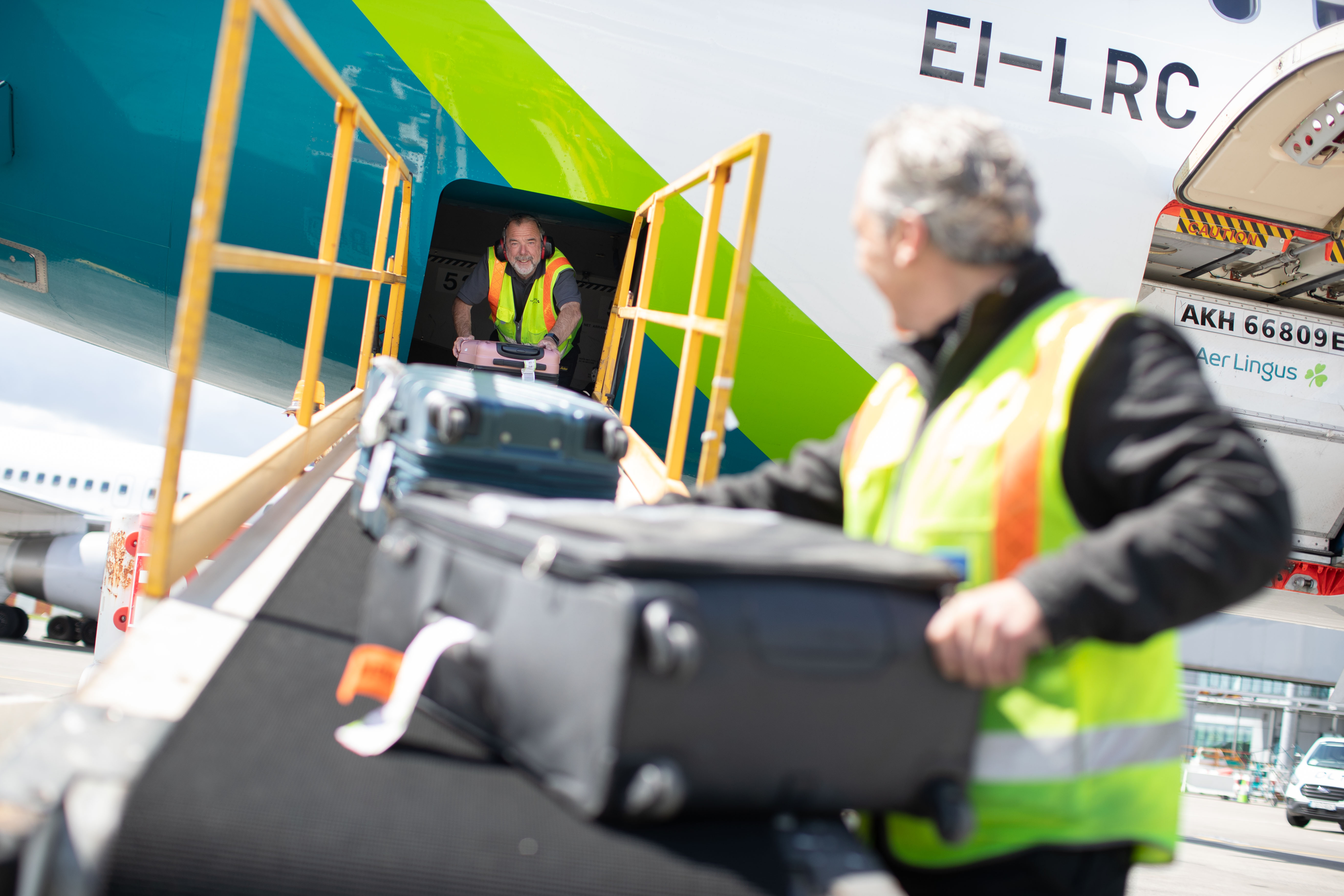 Aer Lingus ground staff handling baggage