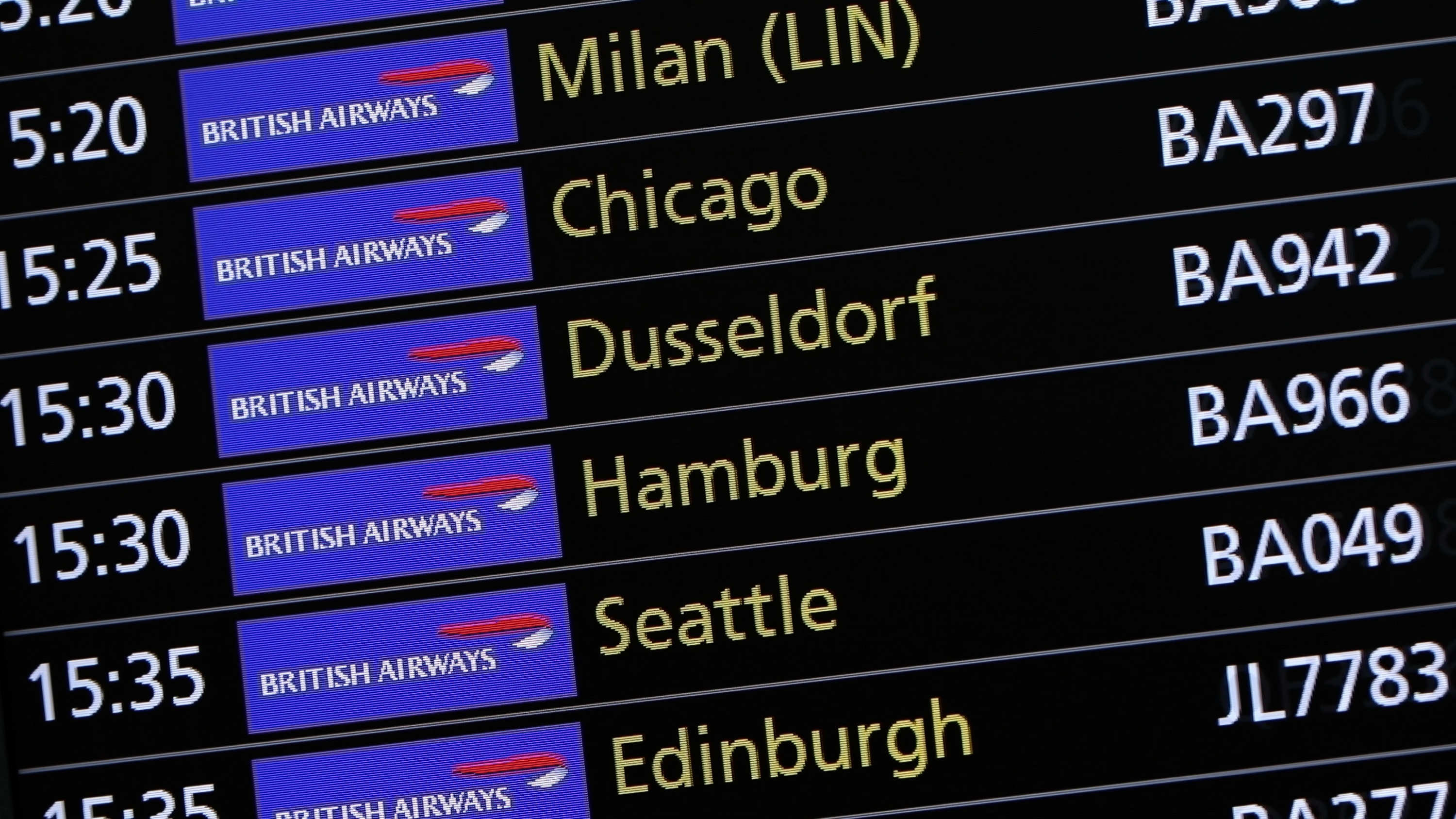 Departure board showing British Airways flights.